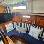 foto del salón de un Beneteau 331 clipper en venta en Interyachts en barcos de segunda mano